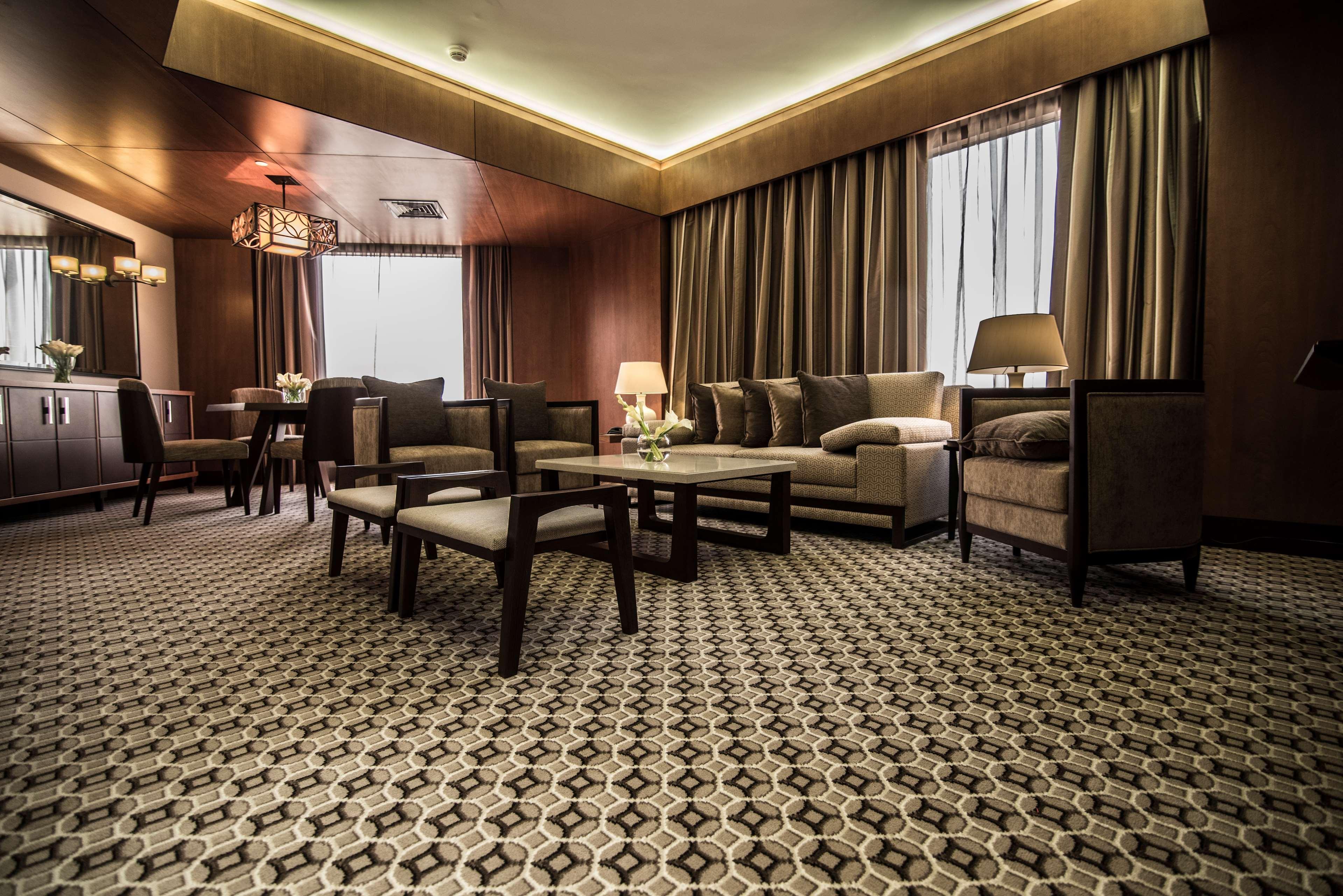 Ayla Grand Hotel Al Ain Buitenkant foto A carpet in a hotel