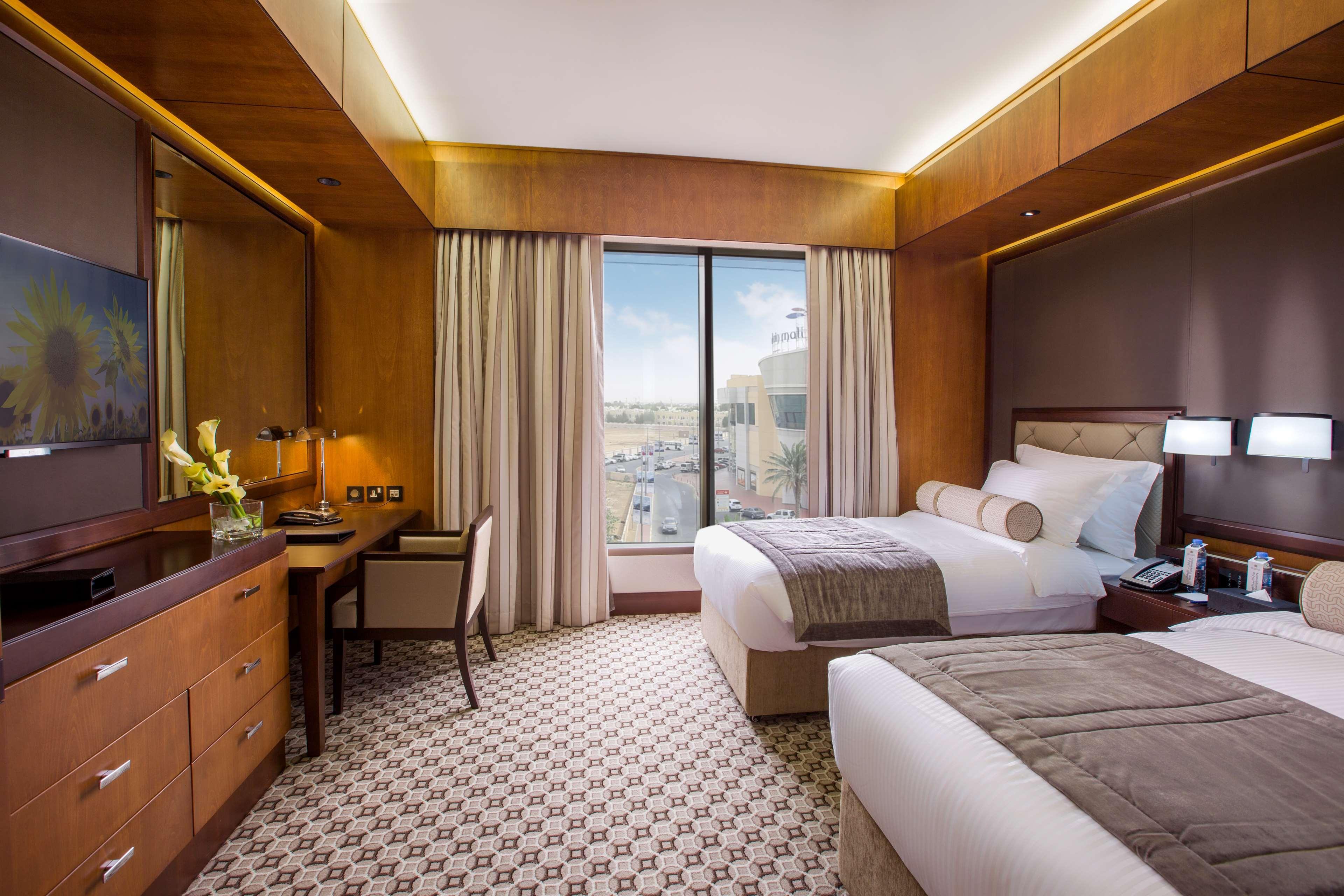 Ayla Grand Hotel Al Ain Buitenkant foto Deluxe Room